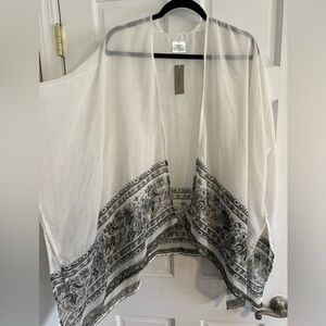 White and black bathing suit cover up top